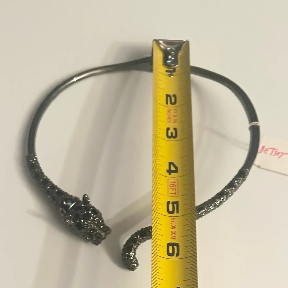 Betsey Johnson panther hinged metal necklace with black crystals.